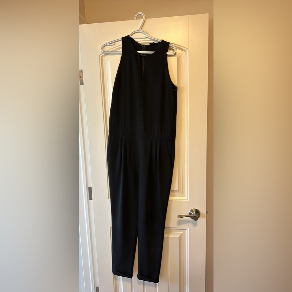 Rag and bone jumpsuit. V neck, waste, detail, pockets, and back front, leather